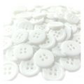 Plain White Ridged 15mm 4-Hole Buttons – 100pcs – White buttons scattered on a white background