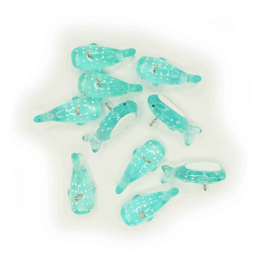 10 × 28 mm Acrylic Shark & Whale Charms – Set of turquoise shark figurines on a white background