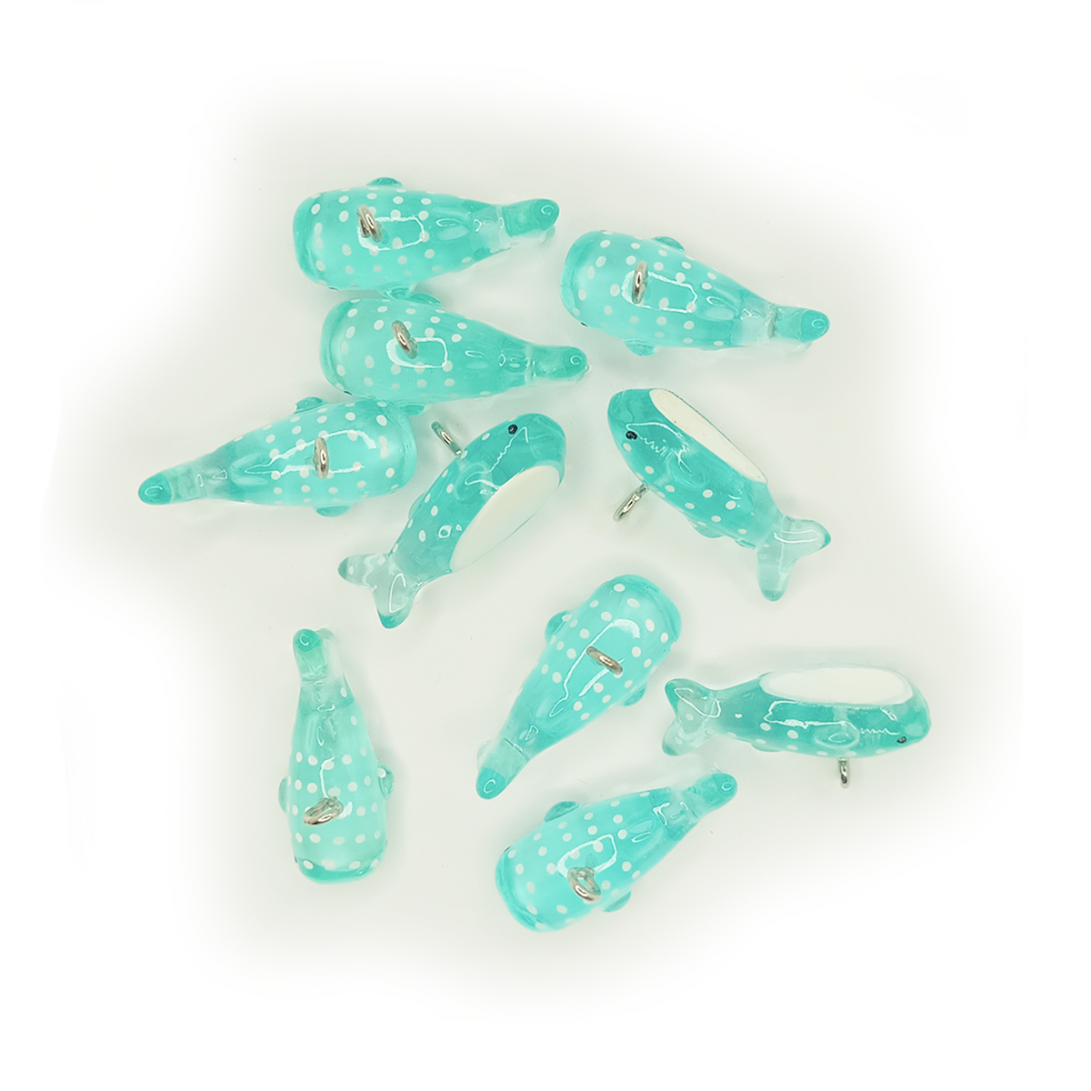 10 × 28 mm Acrylic Shark & Whale Charms – Set of turquoise shark figurines on a white background