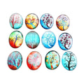 10pcs Glass Cabochons Oval 18x25mm Tree Design 8 – A collection of 10 oval-shaped glass cabochons with a floral and tree pattern design.