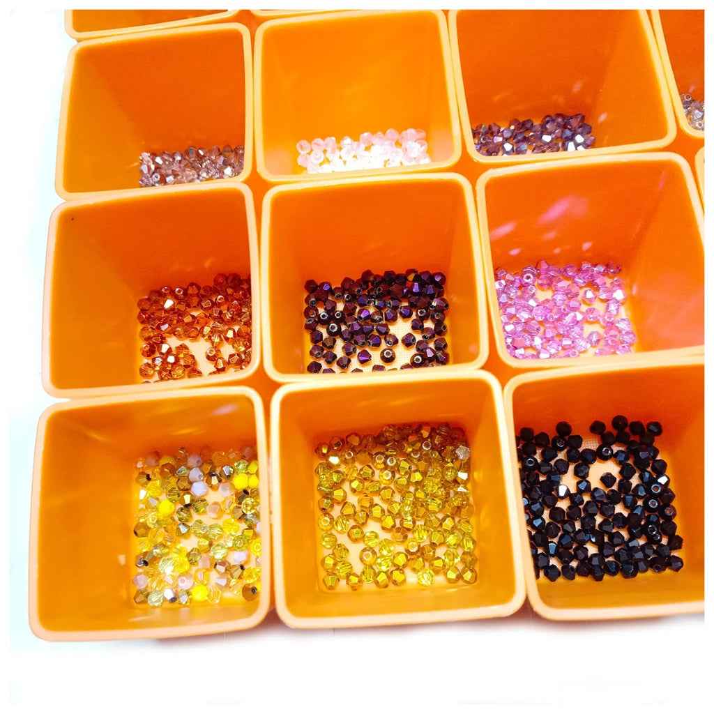 4200pcs 42 Packets 100pcs ea 4mm Bicone Beads Mixed Colours Set – Orange container with compartments filled with various colored beads and sequins on a white background