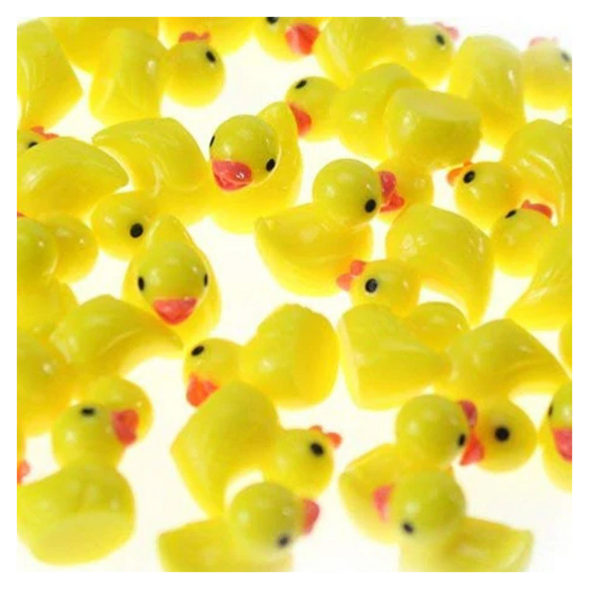 Multiple small yellow ducks with red beaks on a white background