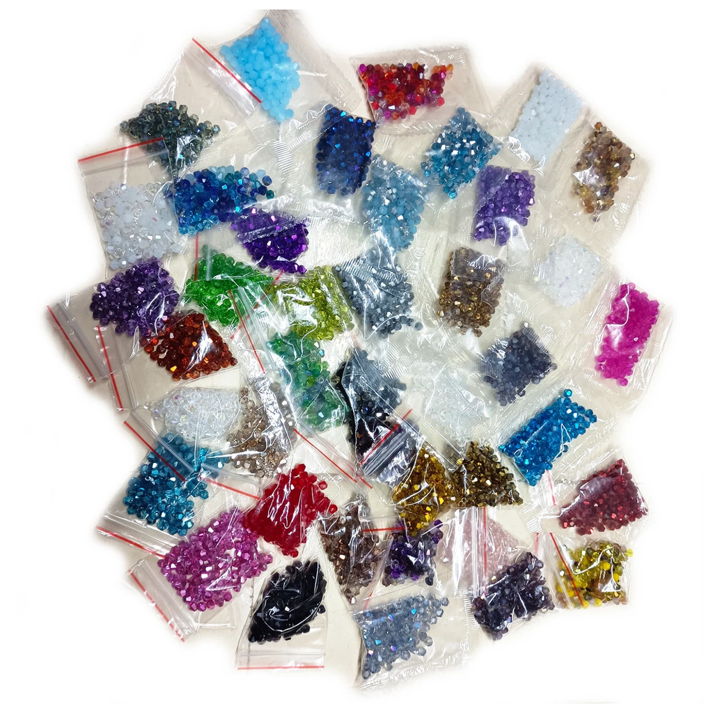 4200pcs 42 Packets 100pcs ea 4mm Bicone Beads Mixed Colours Set – Assorted colored crystals in small clear bags on a white background