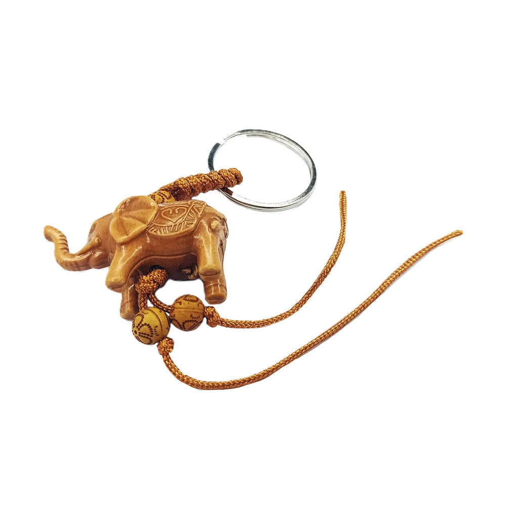 Elephant Wooden Keychain Thai Style Carving – Wooden elephant keychain with a string on a white background