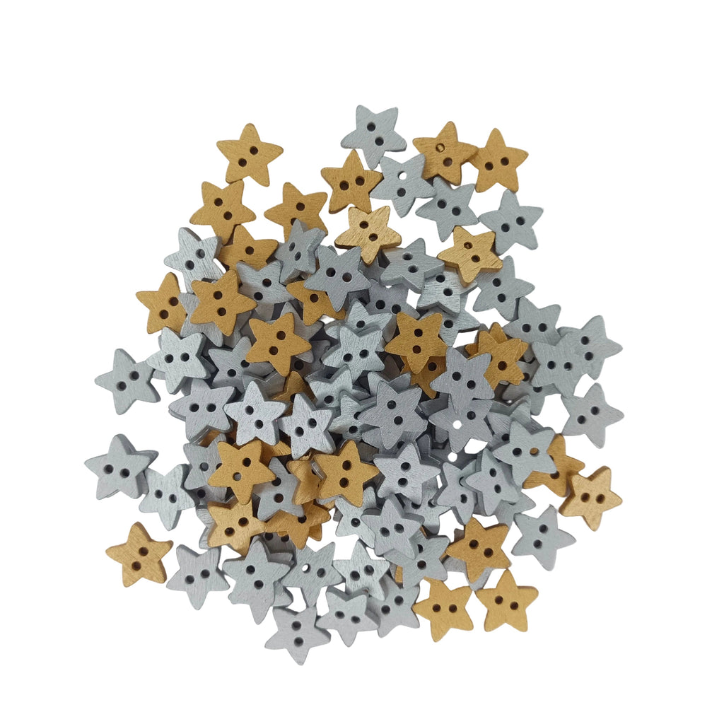 Star Wood Buttons 13mm 2 Holes – Silver & Gold – A pile of small star-shaped wooden buttons in two finishes: natural light wood and painted silver. The buttons are arranged in a loose pile on a clean, light gray background.